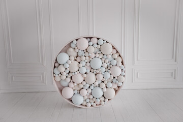 background of balloons in a light studio