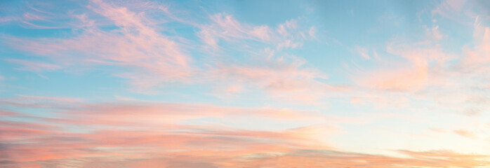 Naklejka na ściany i meble light soft panorama sunset background, blue sky and pink clouds