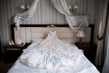 Fototapeta na wymiar bride's wedding dress in the morning room