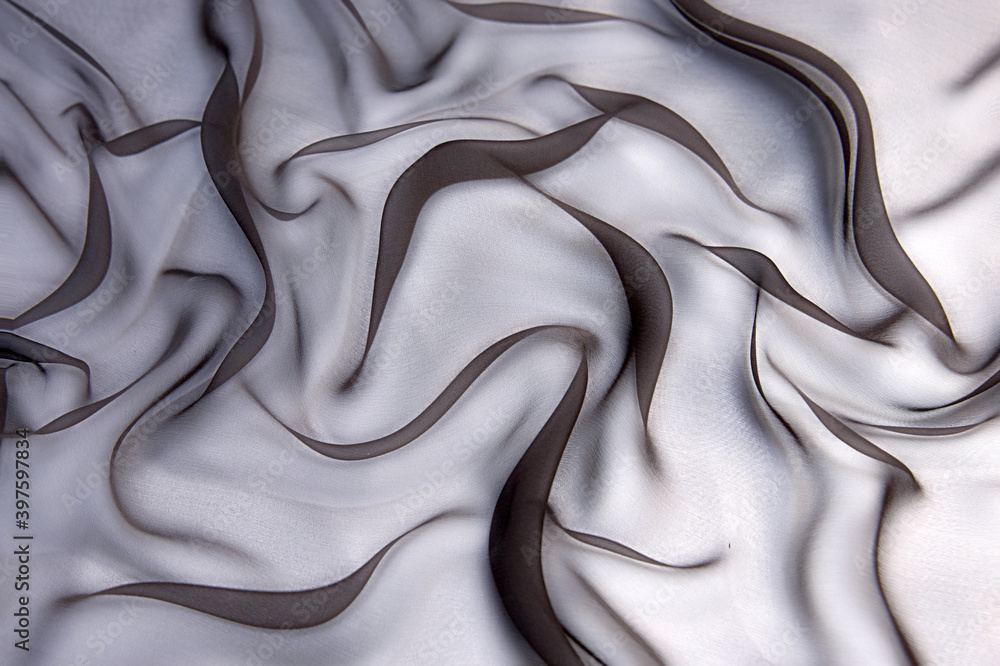Wall mural abstract brown color silk chiffon fabric texture. a mockup of silk tissue as background at the artis