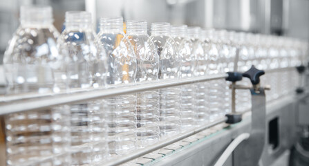 Banner Production of PET plastic bottles on conveyor belt milk and water factory