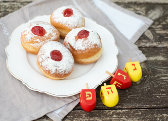 Donuts with nice and creative symbols sevivon, spining  hanukia tasty sweet bakery for Hanukkah day, Jewish traditional holiday  Hanukkah card, Hag Ha Hanukka big miracle was here
