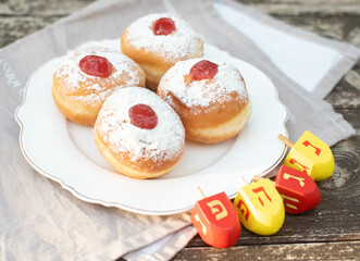 Donuts with nice and creative symbols sevivon, spining  hanukia tasty sweet bakery for Hanukkah day, Jewish traditional holiday  Hanukkah card, Hag Ha Hanukka big miracle was here
