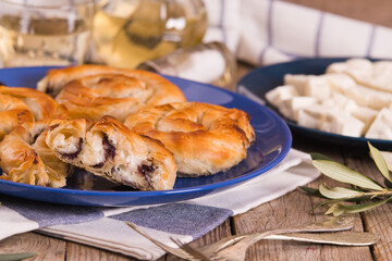 Pastry swirls with cheese and olive filling.
