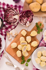 Potato gnocchi stuffed with radicchio and ricotta.
