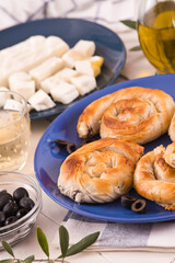 Pastry swirls with cheese and olive filling.
