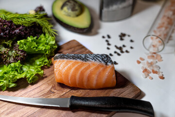 Fototapeta na wymiar fresh salad with salmon preparation home made healthy food