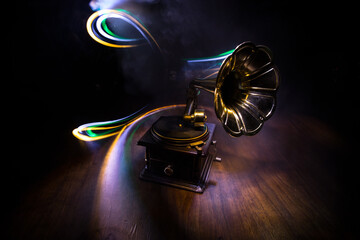 Old gramophone on a dark background. Music concept