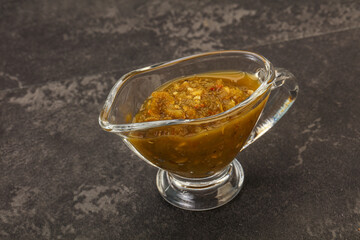 Green spicy sauce in the bowl