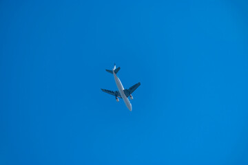 As the commercial plane flies from our top into the open sky and goes far