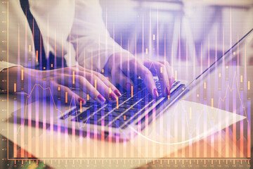 Multi exposure of woman hands typing on computer and financial graph hologram drawing. Stock market analysis concept.