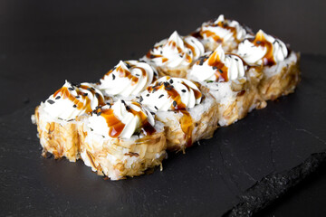 Sushi rolls Bonito and topped with cream cheese