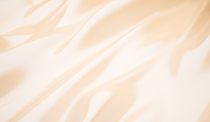 Obraz premium Smooth elegant golden silk wedding background closeup of rippled cream silk fabric lines