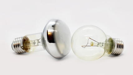 Two glass light bulbs very close