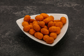 Spicy peanut heap in the bowl