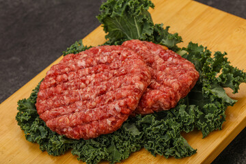 Raw beef burger cutlet for cooking