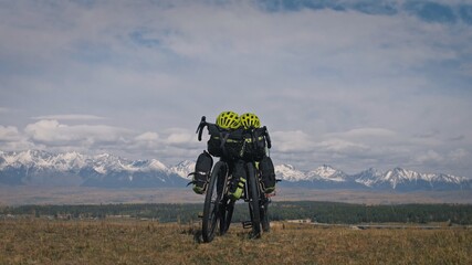 The mixed terrain cycle touring bike with bikepacking. The travel journey with light bicycle bags...