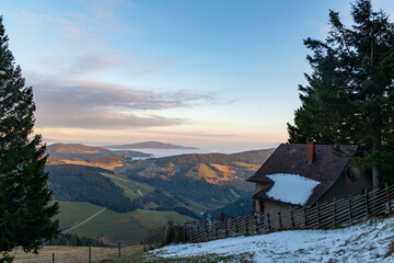 Fototapeta Single hut wie view over the mountains at Sommeralm, Austria obraz