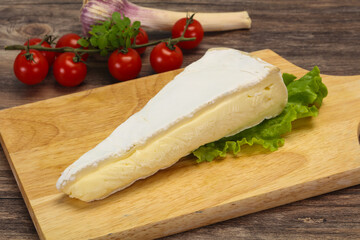 Brie cheese triangle served salad