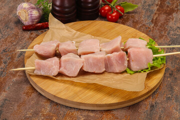 Raw pork meat skewer for grill