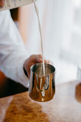 pouring milk into a glass