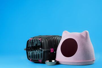Cat house and animal carrier cage close up