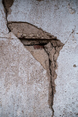 cracked walls with splices in old concrete building