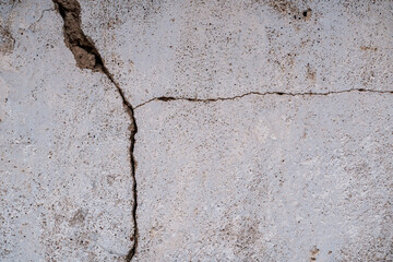 cracked walls with splices in old concrete building