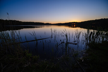 dramatatic red dark sunset over the fields and cities