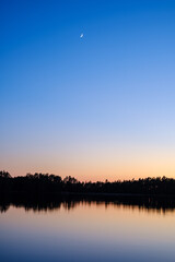 dramatatic red dark sunset over the fields and cities