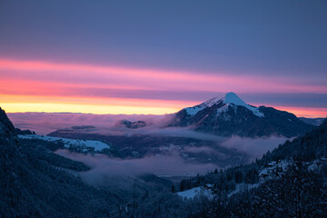 Fototapeta na wymiar Pink clouds over the alps