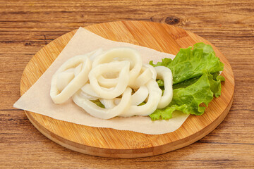 Raw squid rings for cooking