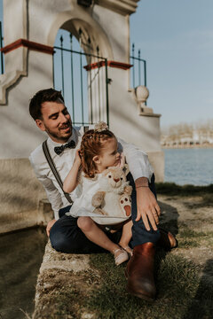 family with children - little girls having a free moment of intimacy
