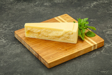 Hard parmesan cheese served basil