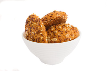 Handmade oat cookies with sesame and different seeds, isolated