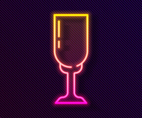 Glowing neon line Glass of champagne icon isolated on black background. Vector.