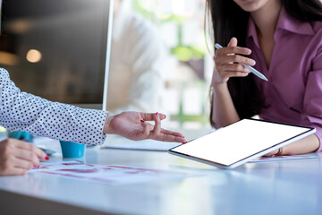 Group of young ui ux graphic designer people collaborating on project in office.