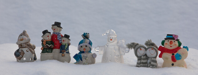 christmas toy snowmen in the snow