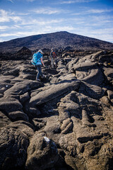 Hikers walking to the summit of the Piton de la Fournaise volcano in Réunion