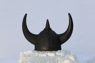 black viking helmet on ice
