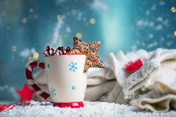 Cozy winter dessert drink with marshmallow with Christmas decorations