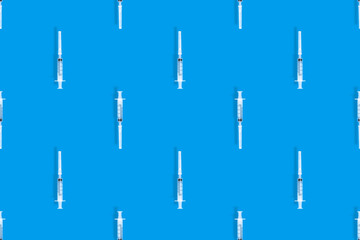 Seamless patterns. Medical syringes seamless pattern. Medical syringes background.