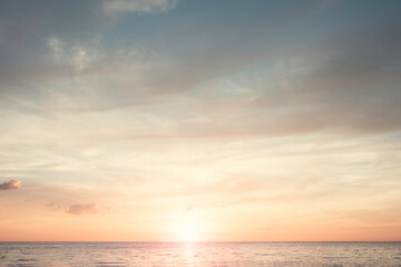 Sunset beach sky background concept, sunrise colors clouds, horizon dawn sunlight.