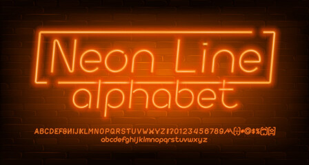 Neon Line alphabet font. Orange neon light letters, numbers and symbols. Brick wall background. Stock vector typescript for your design. © epifantsev