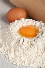 Pile of flour with egg on top