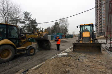 Road construction, courtyard area. Construction site. production of apartments, social housing.
