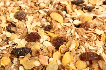Raw muesli with dried fruits. Macro.