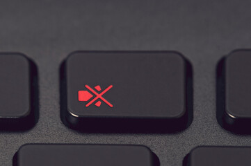 mute button close-up, copy space
