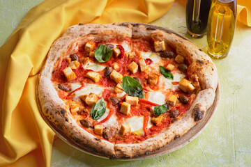 Delicious Italian pizza with chicken meat, egg and mozzarella cheese.