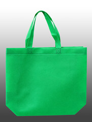 green cloth shopping bag isolated on black and white guardian background